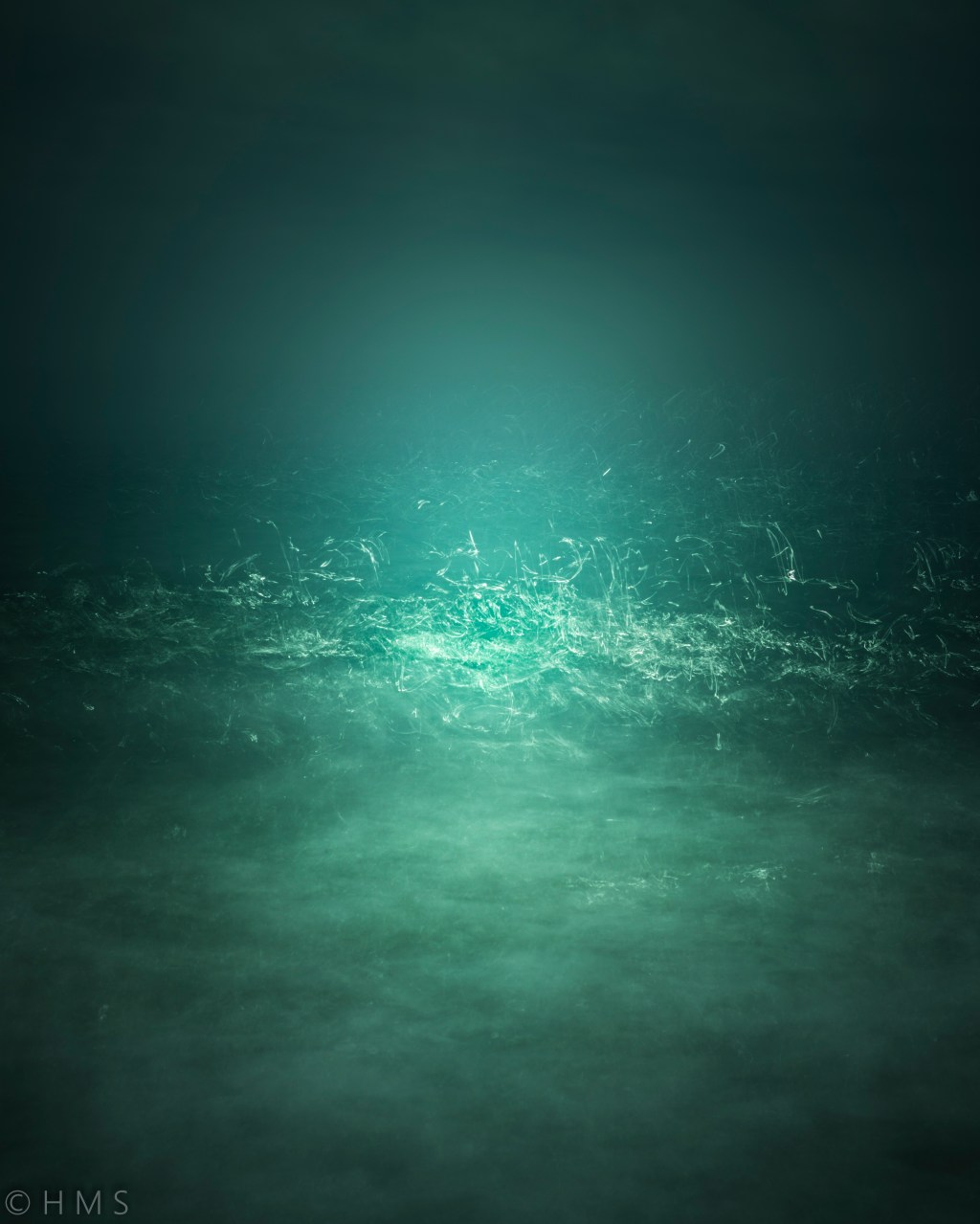 Abstract fine art photograph of the sea transformed into ethereal textures, soft blues and whites through intentional camera movement, by Héctor Morón