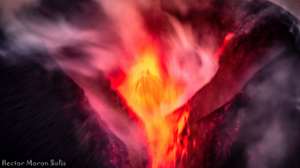 Interior of the Volcano – abstract ICM fine art photograph by Héctor Morón, glowing depths of volcanic fire and motion