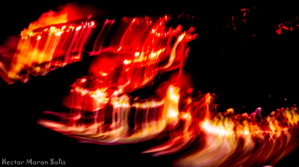 Lava II – abstract ICM fine art photograph by Héctor Morón, La Palma volcano eruption with molten lava in motion and glowing light