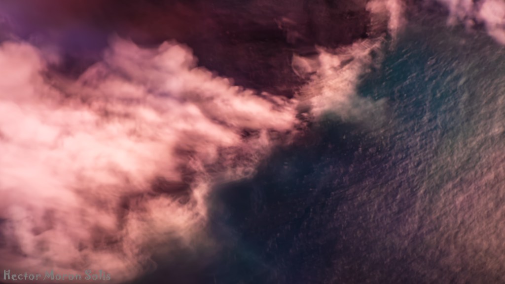 Lava Reaches the Sea, abstract volcanic fine art photography with intentional camera movement (ICM); molten lava entering the ocean in daylight, red and blue contrasts.