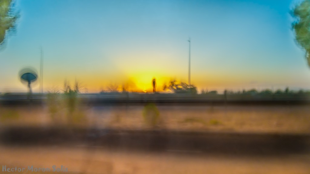 A Person on the Highway under the Sun abstract ICM fine art photograph with human silhouette and sunset by Héctor Morón