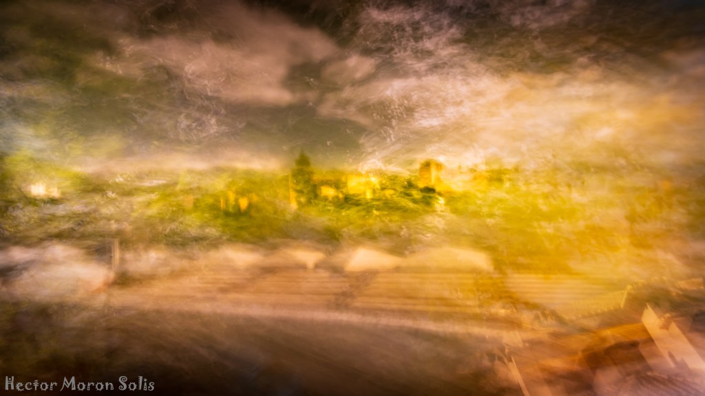 Abstract ICM fine art photograph where the Alhambra dissolves into surrounding forest — a poetic vision of nature reclaiming the monument, created within the Allegorical Abstractionism movement.