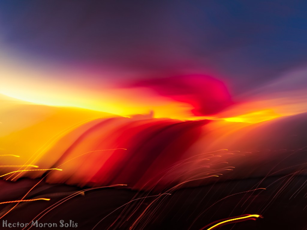 Abstract ICM fine art photograph by Héctor Morón – the Bell Tower of Loja consumed by a wave of radiant light, symbolizing destruction and transcendence.