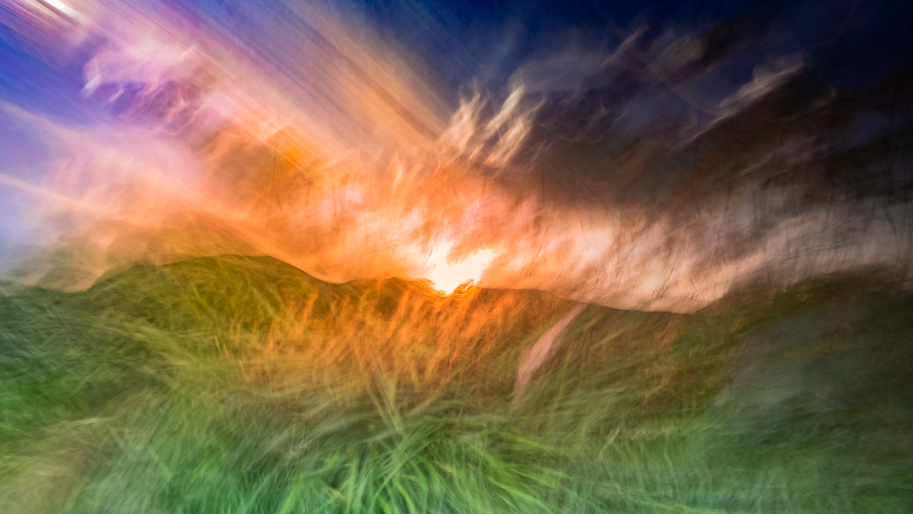 The Sun Against the Clouds – abstract ICM fine art photograph by Héctor Morón showing sunlight dissolving storm clouds.