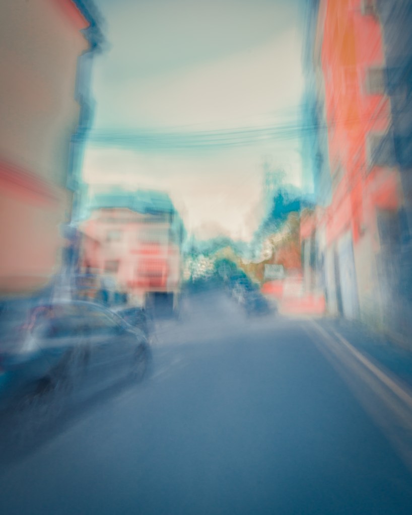 Just Cars — The street is fully claimed by machines. Mobility, rhythm, and desire belong to vehicles; human life is reduced to absence.